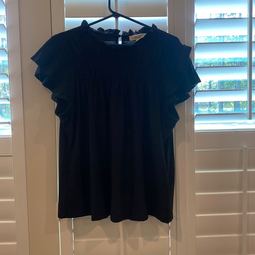 Black short sleeve blouse with flutter sleeve